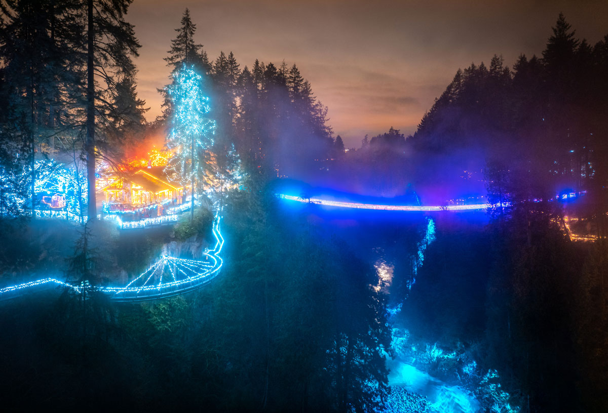 The illuminated Capilano Suspension Bridge at night 